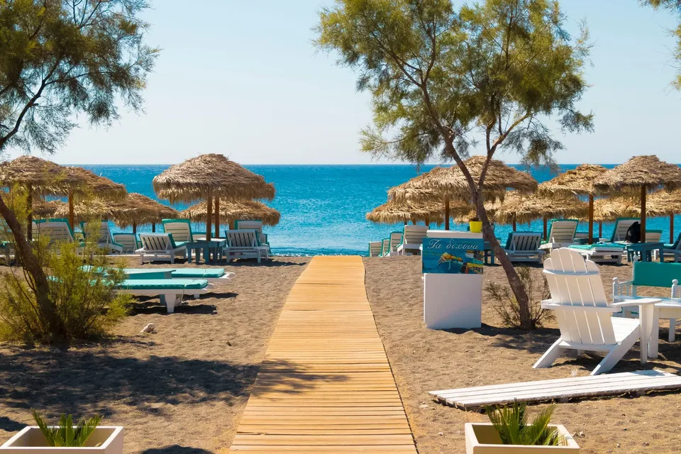 Beach chair on a Santorini beach with ocean view